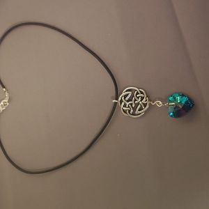 Swarovski and Celtic Necklace on Black Leather Cord. Length 20 inches.